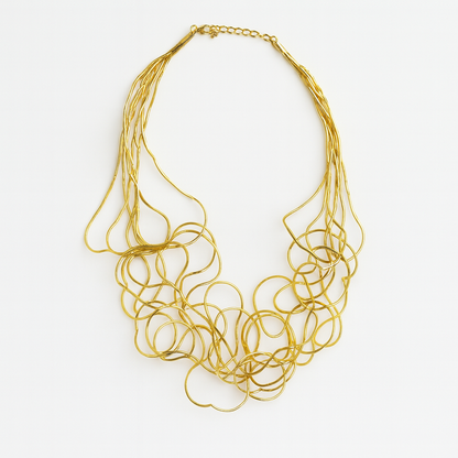 Collana Scultura Metallica – Disponibile in Oro, Argento e Tricolore