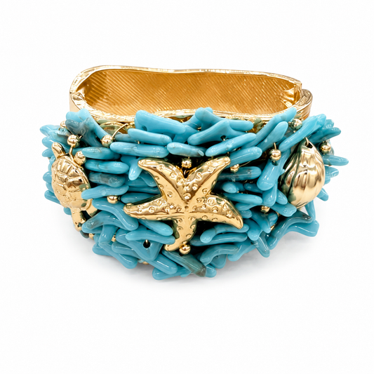 Bracciale Statement Azzurro con Stella Marina e Dettagli Dorati