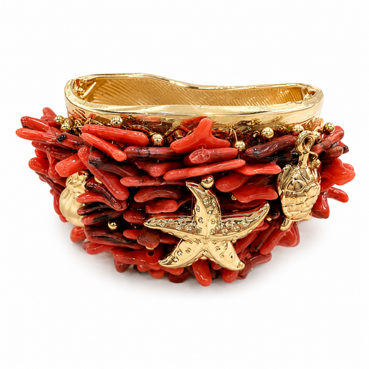Bracciale Rigido Rosso Corallo Chiaro con Stella Marina e Charm Dorati