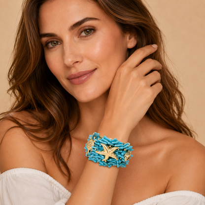 Bracciale Statement Azzurro con Stella Marina e Dettagli Dorati